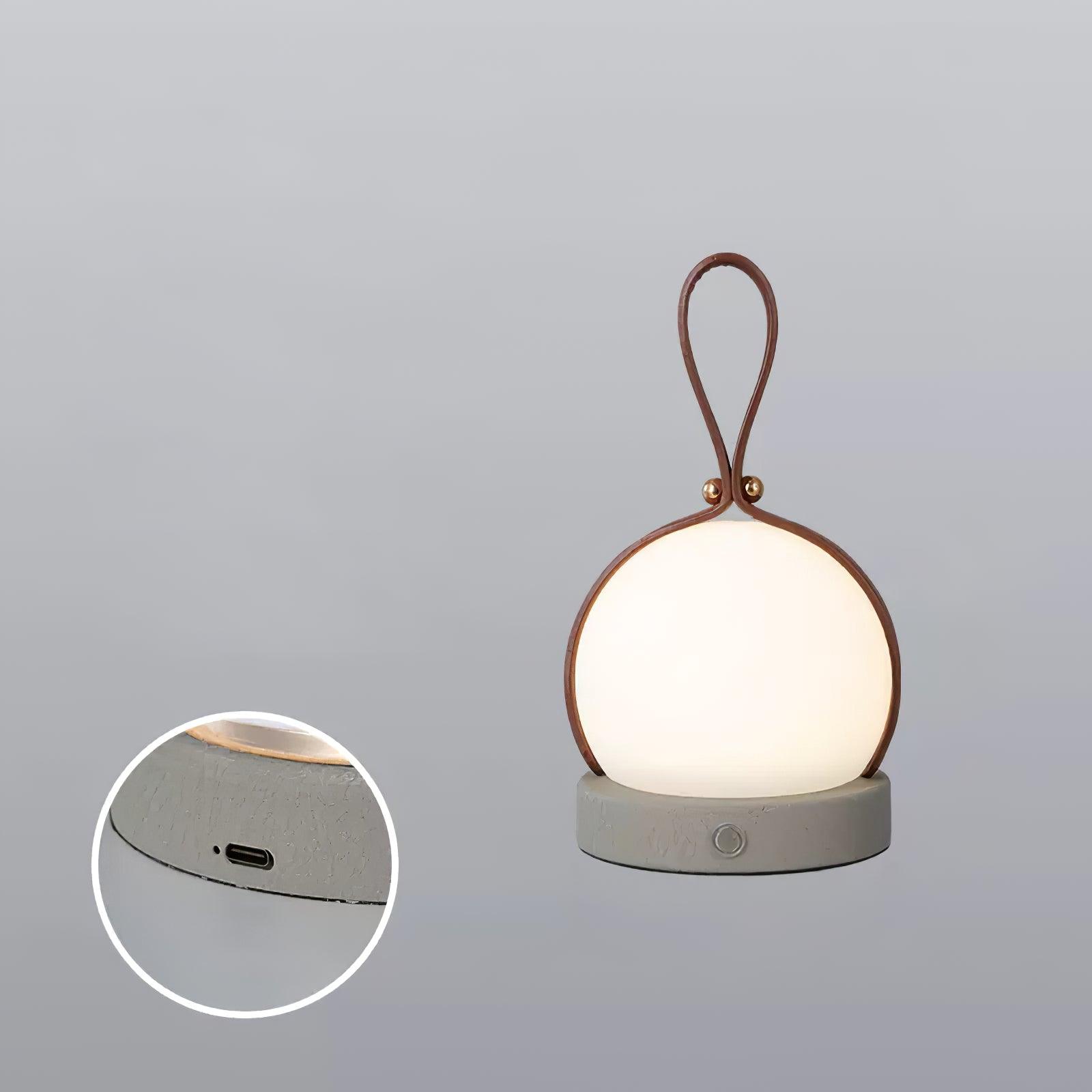 Based on the data provided:1. Core product: Table Lamp
2. Selling points: Built-in Battery, Lantern, Material: Iron, PE, Imitation leather cord.
3. New title: Bola Lantern Table Lamp | Iron, PE, Imitation Leather Cord | Built-in Battery