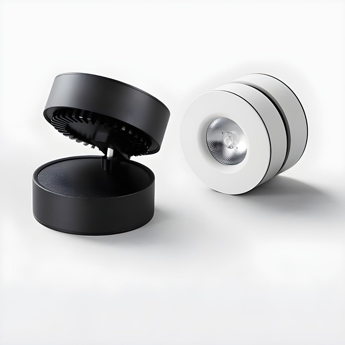 Lyric Adjustable Surface Downlight | Metal, Aluminum, Acrylic | Black, White