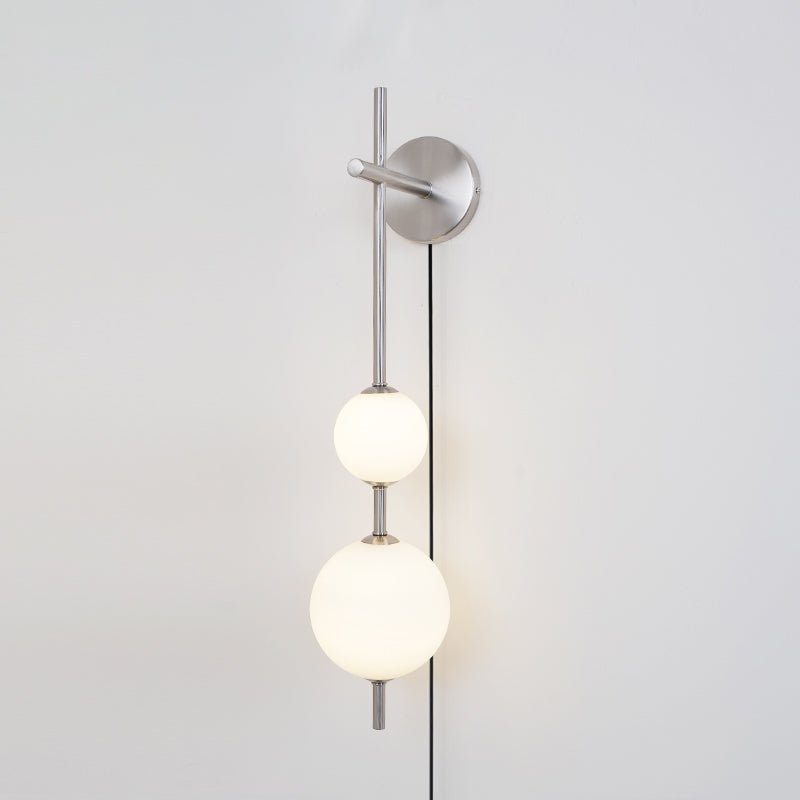 Vertical Globe Wall Lamp | Brass & Metal | Matte White Glass Shade