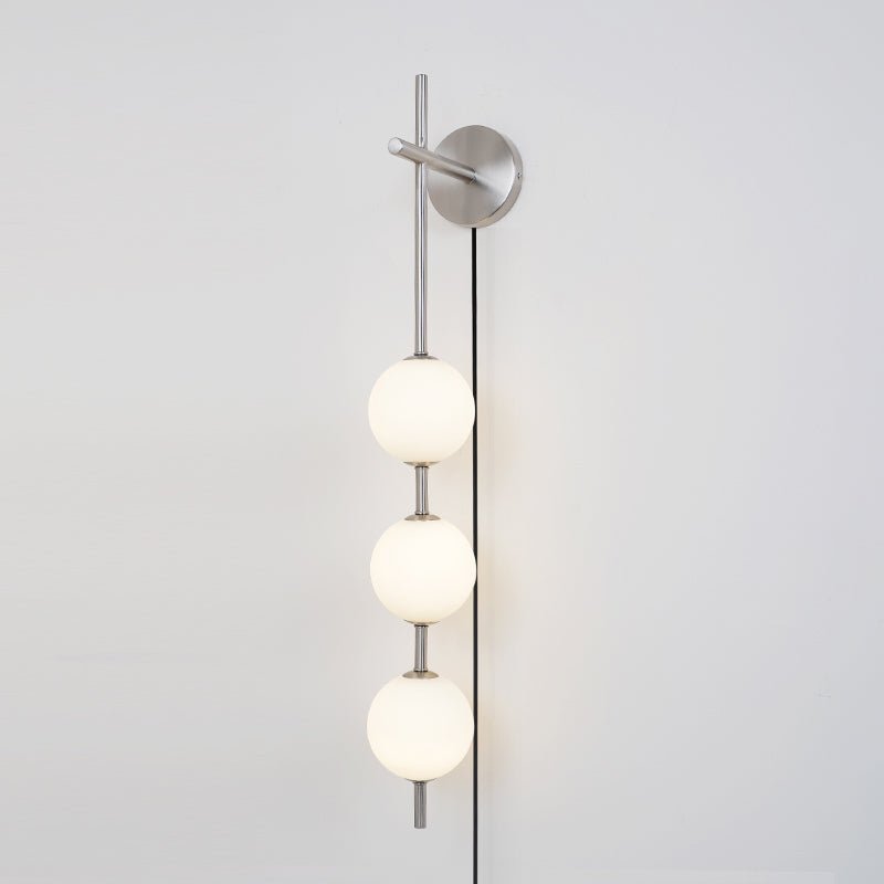 Vertical Globe Wall Lamp | Brass & Metal | Matte White Glass Shade