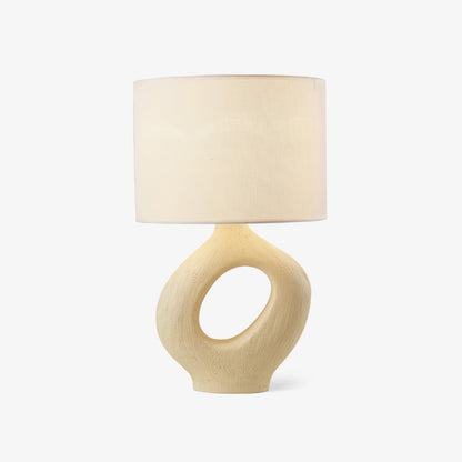 Based on the provided data:1.  Core product: Table Lamp
2.  Selling points: Sculptural design, ceramic base, available colors, fabric shade
3.  New title: Sculptural Table Lamp | Ceramic Base | Beige, Black, White, Grey