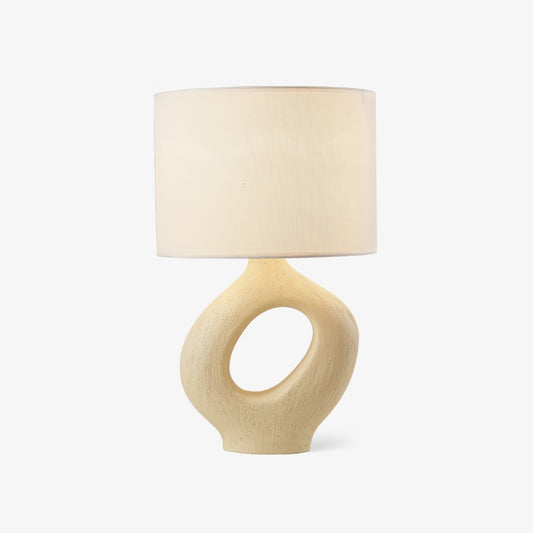 Based on the provided data:1.  Core product: Table Lamp
2.  Selling points: Sculptural design, ceramic base, available colors, fabric shade
3.  New title: Sculptural Table Lamp | Ceramic Base | Beige, Black, White, Grey