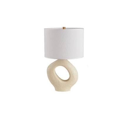 Based on the provided data:1.  Core product: Table Lamp
2.  Selling points: Sculptural design, ceramic base, available colors, fabric shade
3.  New title: Sculptural Table Lamp | Ceramic Base | Beige, Black, White, Grey