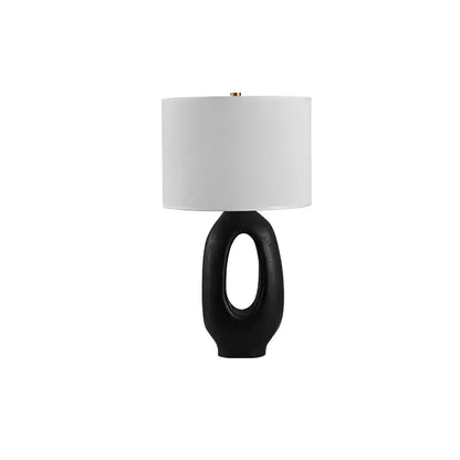 Based on the provided data:1.  Core product: Table Lamp
2.  Selling points: Sculptural design, ceramic base, available colors, fabric shade
3.  New title: Sculptural Table Lamp | Ceramic Base | Beige, Black, White, Grey