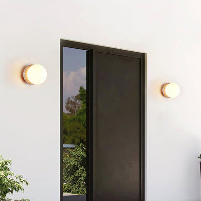 Asteroid Wall Light | Travertine, Metal, Glass | Yellow