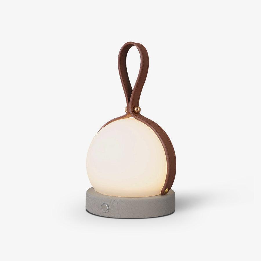 Based on the data provided:1.  Core product: Table Lamp
2.  Selling points: Built-in Battery, Lantern, Material: Iron, PE, Imitation leather cord.
3.  New title: Bola Lantern Table Lamp | Iron, PE, Imitation Leather Cord | Built-in Battery