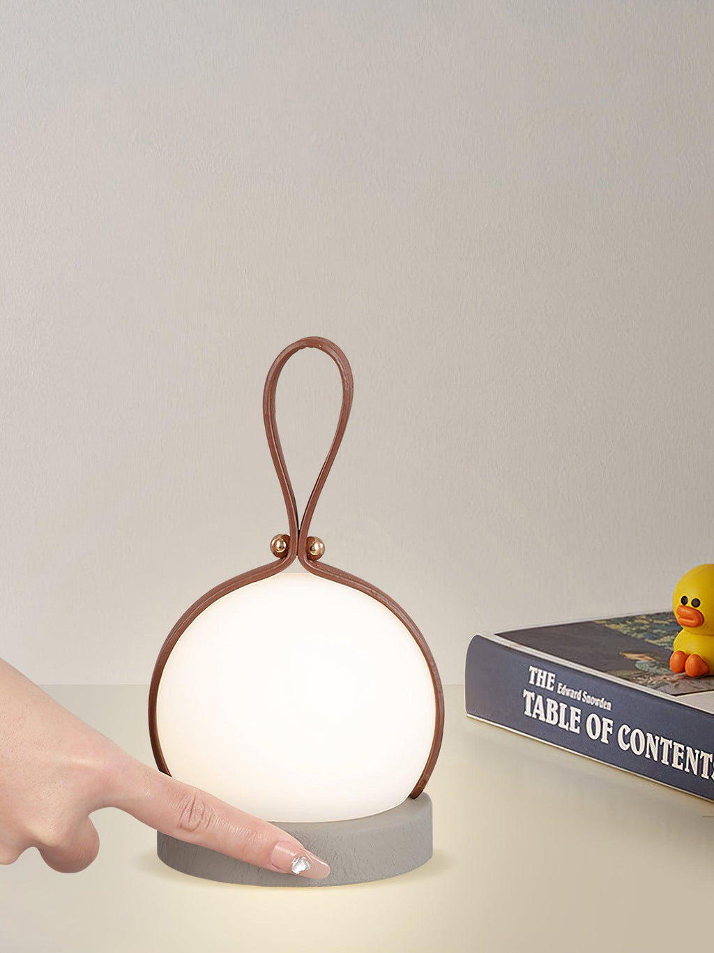 Based on the data provided:1.  Core product: Table Lamp
2.  Selling points: Built-in Battery, Lantern, Material: Iron, PE, Imitation leather cord.
3.  New title: Bola Lantern Table Lamp | Iron, PE, Imitation Leather Cord | Built-in Battery