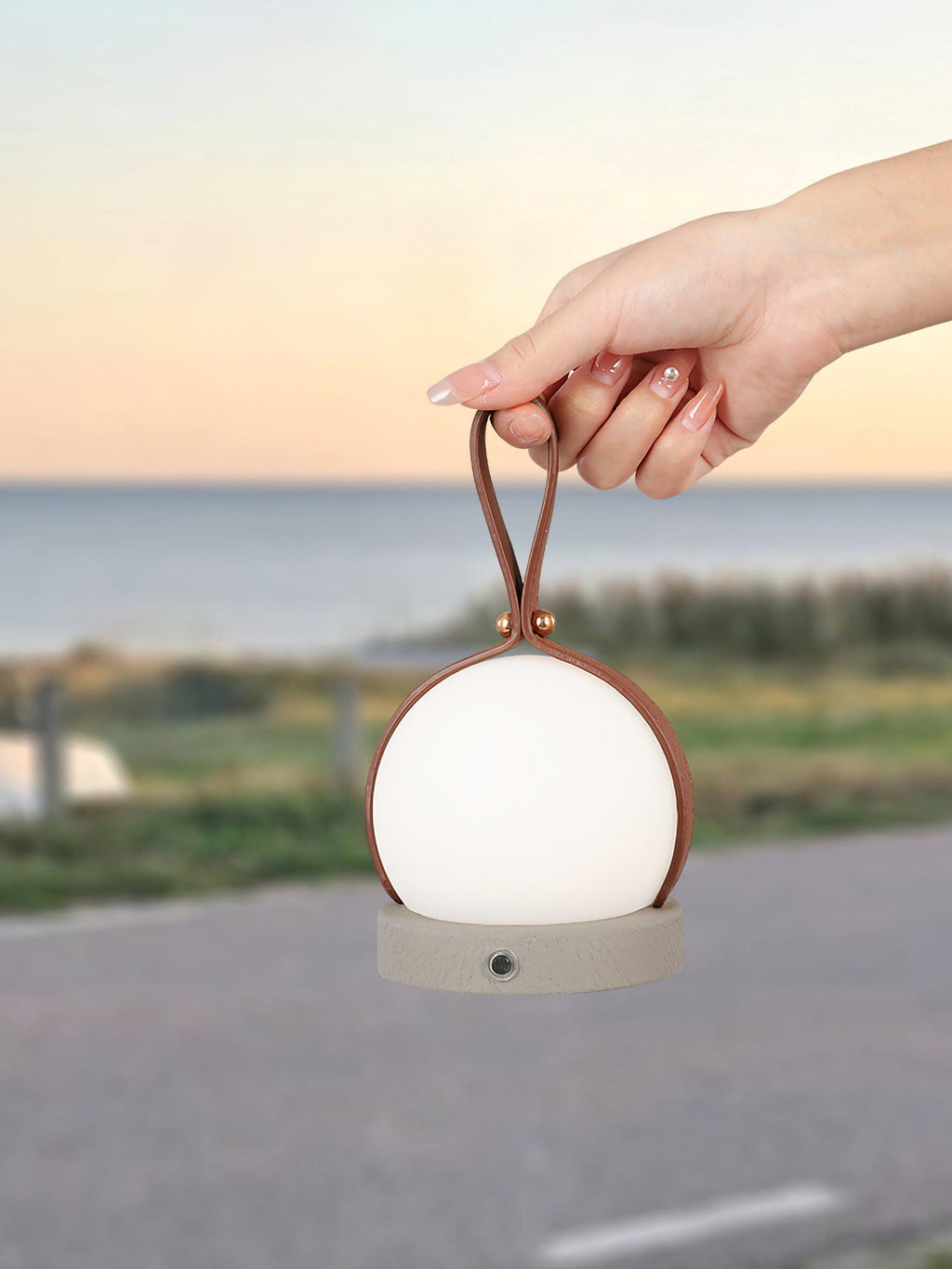 Based on the data provided:1.  Core product: Table Lamp
2.  Selling points: Built-in Battery, Lantern, Material: Iron, PE, Imitation leather cord.
3.  New title: Bola Lantern Table Lamp | Iron, PE, Imitation Leather Cord | Built-in Battery