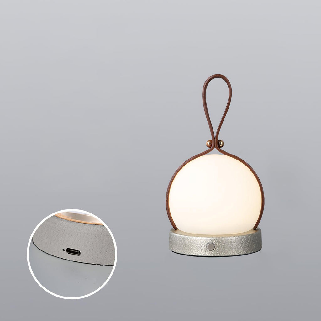 Based on the data provided:1.  Core product: Table Lamp
2.  Selling points: Built-in Battery, Lantern, Material: Iron, PE, Imitation leather cord.
3.  New title: Bola Lantern Table Lamp | Iron, PE, Imitation Leather Cord | Built-in Battery
