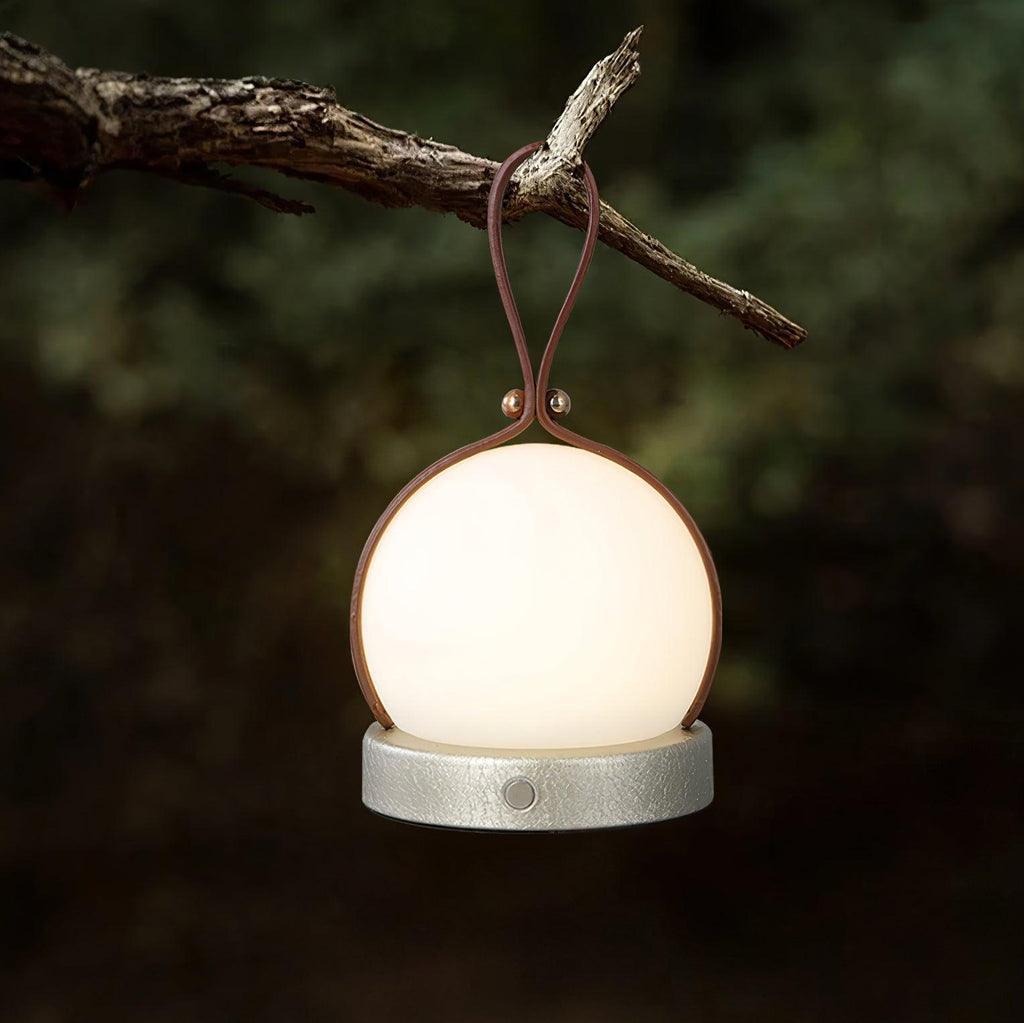 Based on the data provided:1.  Core product: Table Lamp
2.  Selling points: Built-in Battery, Lantern, Material: Iron, PE, Imitation leather cord.
3.  New title: Bola Lantern Table Lamp | Iron, PE, Imitation Leather Cord | Built-in Battery