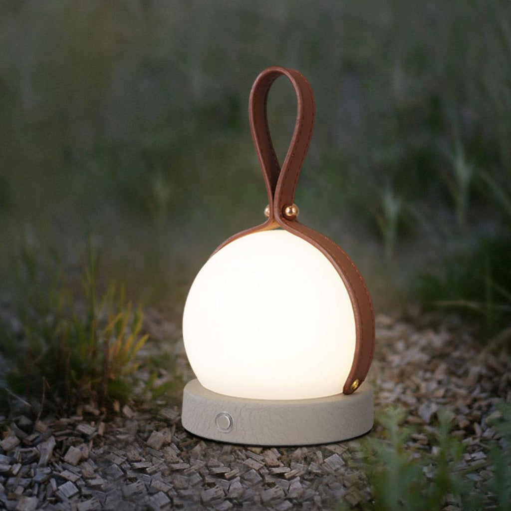 Based on the data provided:1.  Core product: Table Lamp
2.  Selling points: Built-in Battery, Lantern, Material: Iron, PE, Imitation leather cord.
3.  New title: Bola Lantern Table Lamp | Iron, PE, Imitation Leather Cord | Built-in Battery