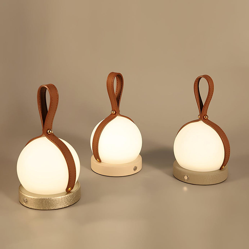 Based on the data provided:1.  Core product: Table Lamp
2.  Selling points: Built-in Battery, Lantern, Material: Iron, PE, Imitation leather cord.
3.  New title: Bola Lantern Table Lamp | Iron, PE, Imitation Leather Cord | Built-in Battery