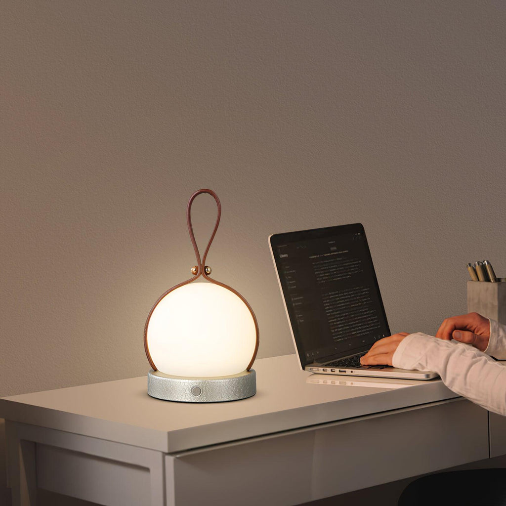 Based on the data provided:1.  Core product: Table Lamp
2.  Selling points: Built-in Battery, Lantern, Material: Iron, PE, Imitation leather cord.
3.  New title: Bola Lantern Table Lamp | Iron, PE, Imitation Leather Cord | Built-in Battery