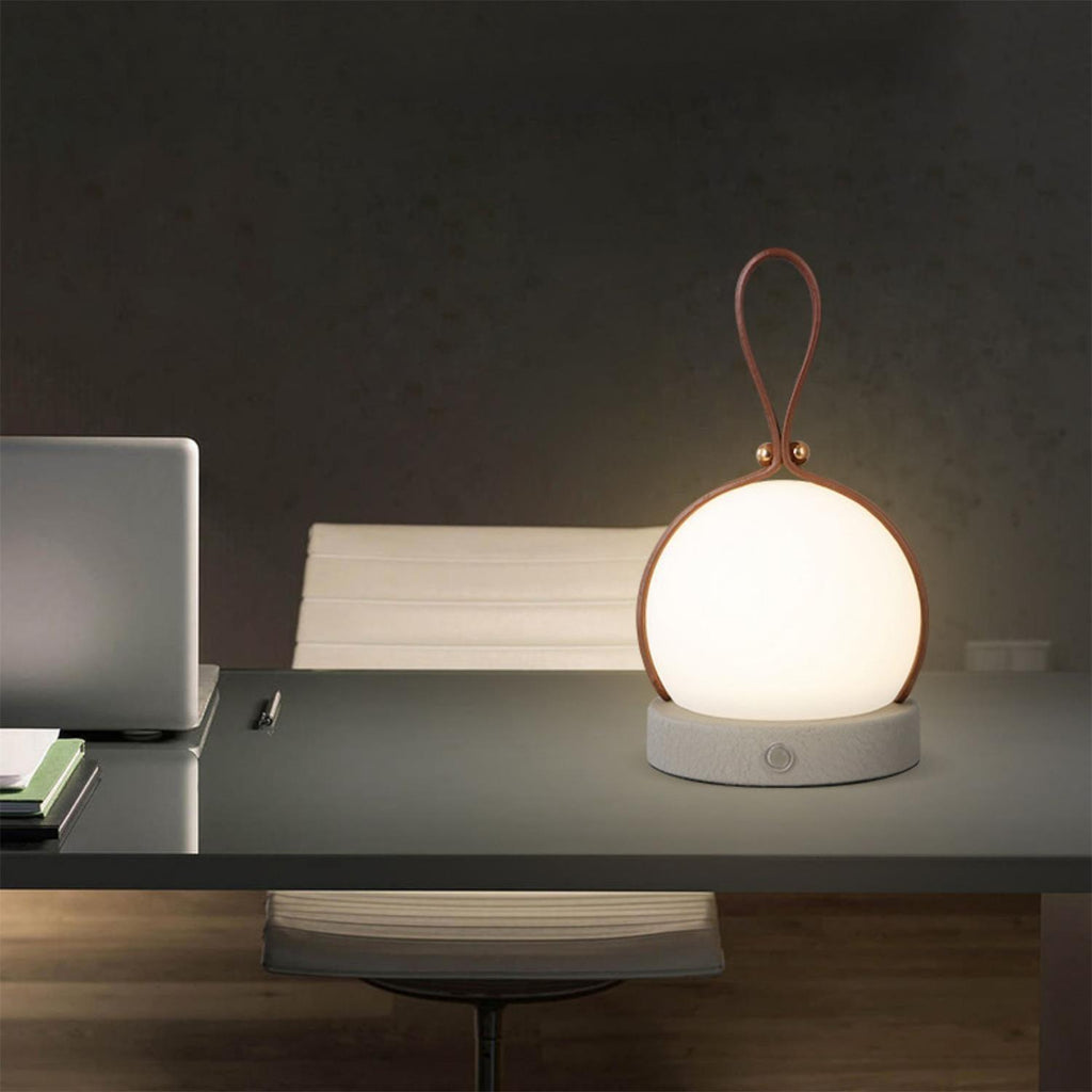 Based on the data provided:1.  Core product: Table Lamp
2.  Selling points: Built-in Battery, Lantern, Material: Iron, PE, Imitation leather cord.
3.  New title: Bola Lantern Table Lamp | Iron, PE, Imitation Leather Cord | Built-in Battery