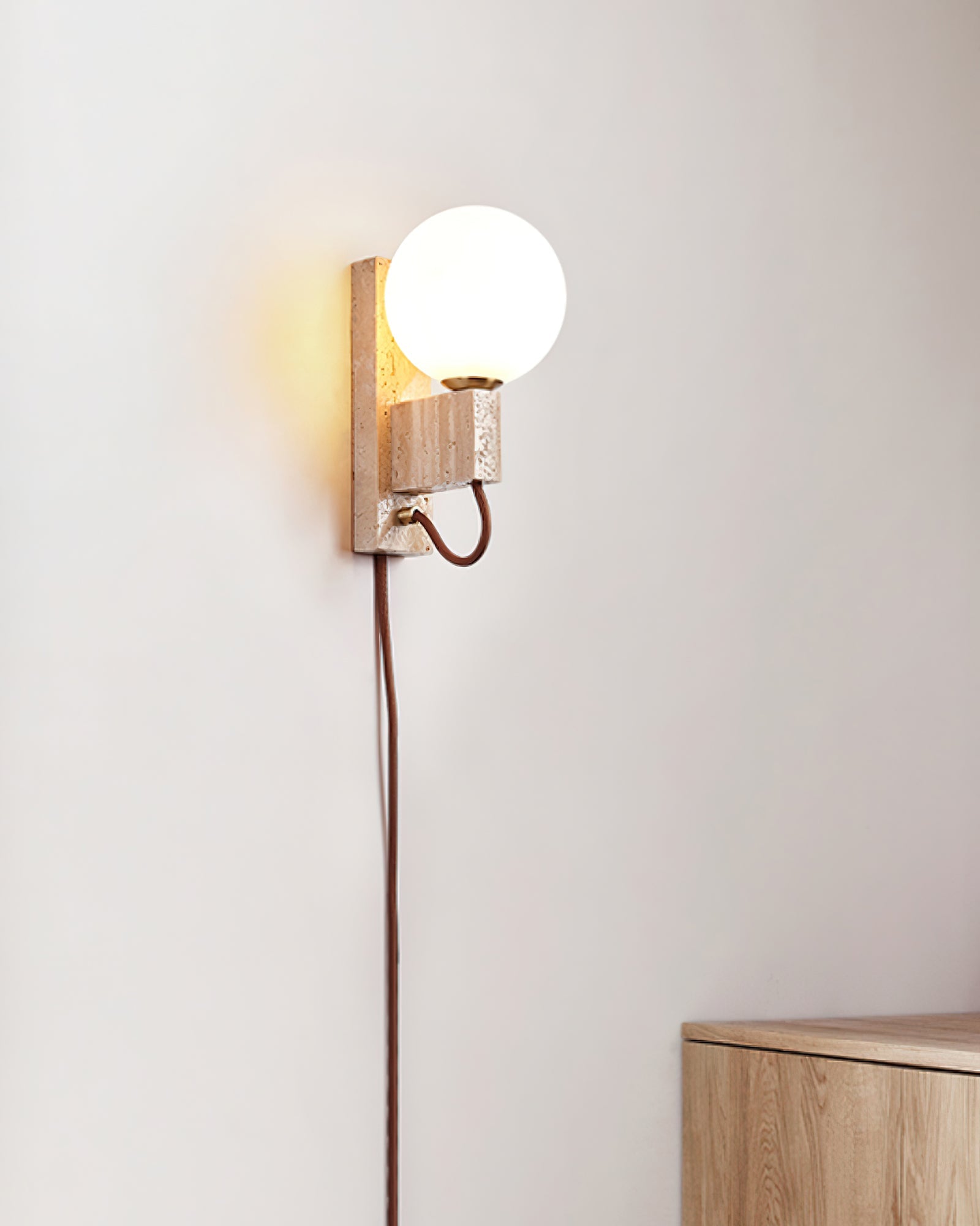 Atlas Globe Wall Sconce | Travertine & Opal Glass | Yellow Travertine