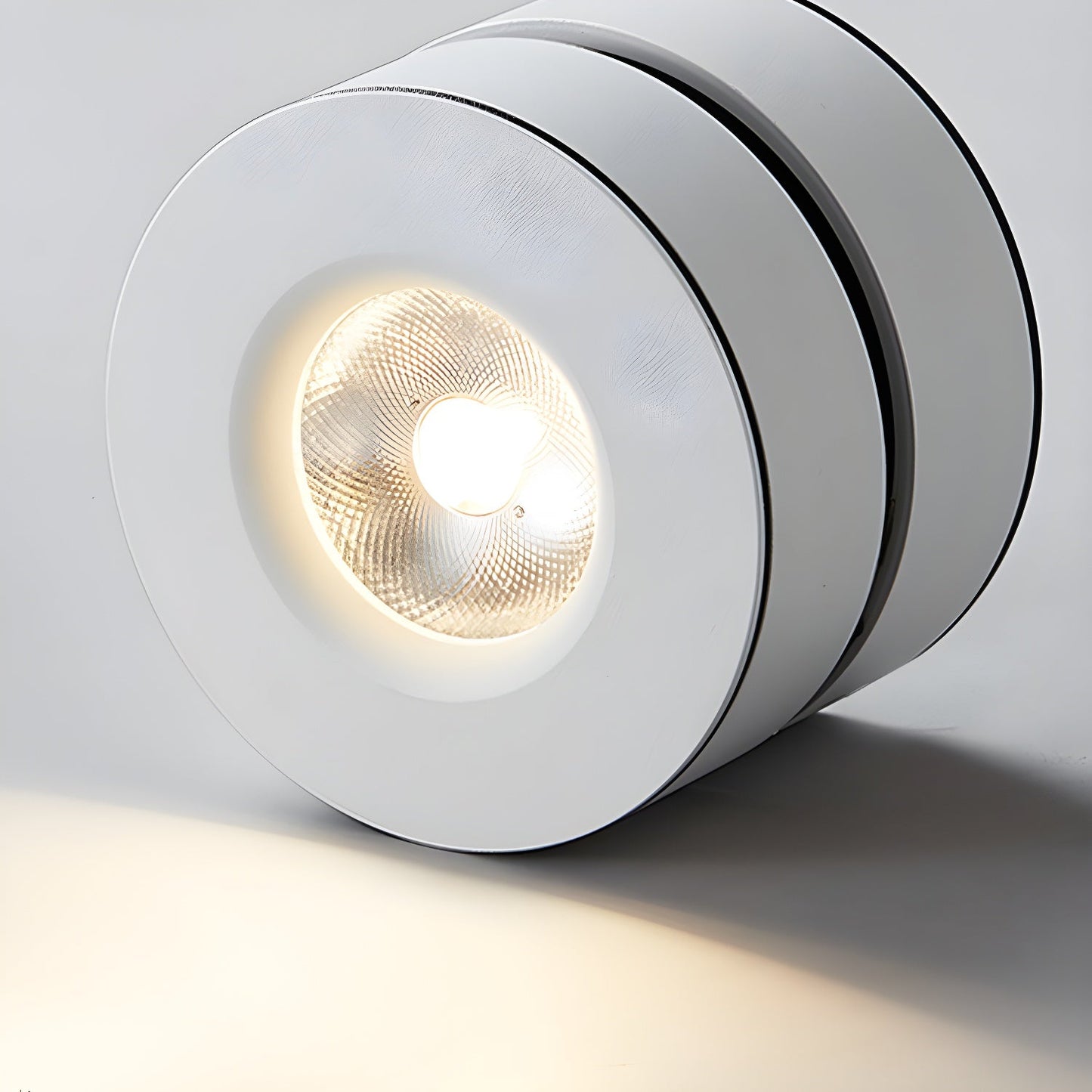 Lyric Adjustable Surface Downlight | Metal, Aluminum, Acrylic | Black, White