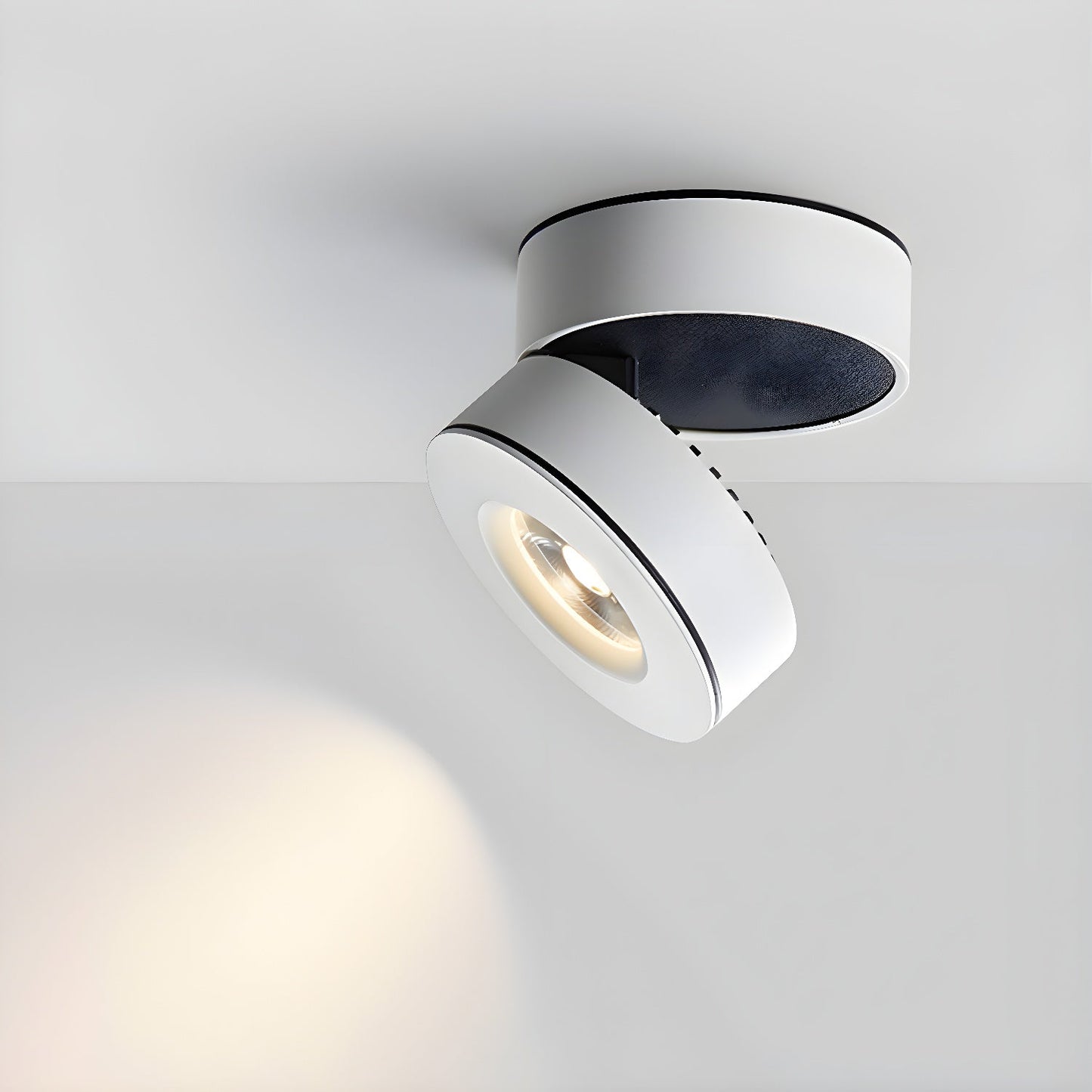 Lyric Adjustable Surface Downlight | Metal, Aluminum, Acrylic | Black, White