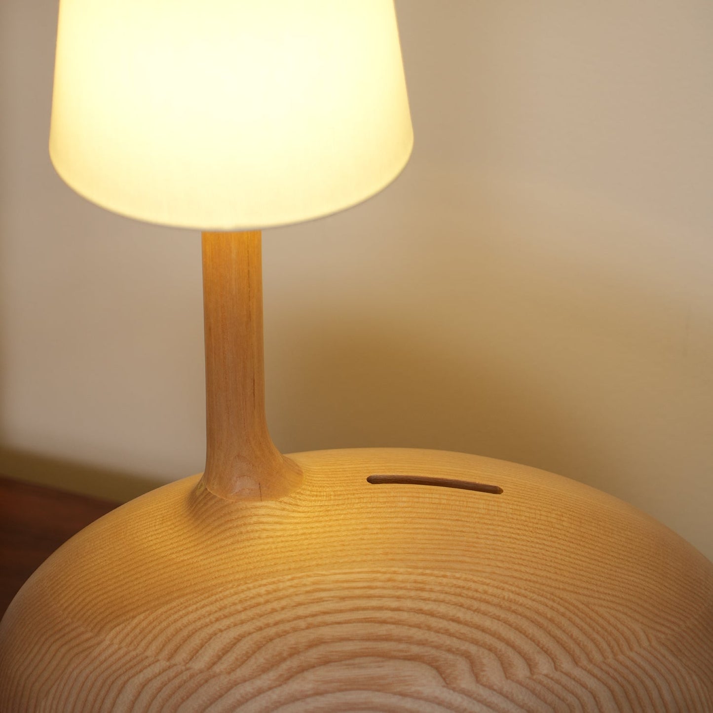 Snail Table Lamp | Wooden Base with White Shade | 30cm Diameter