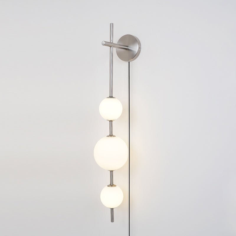 Vertical Globe Wall Lamp | Brass & Metal | Matte White Glass Shade