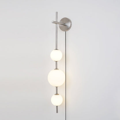 Vertical Globe Wall Lamp | Brass & Metal | Matte White Glass Shade